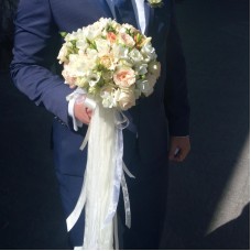 Bridal bouquet of light colour flowers